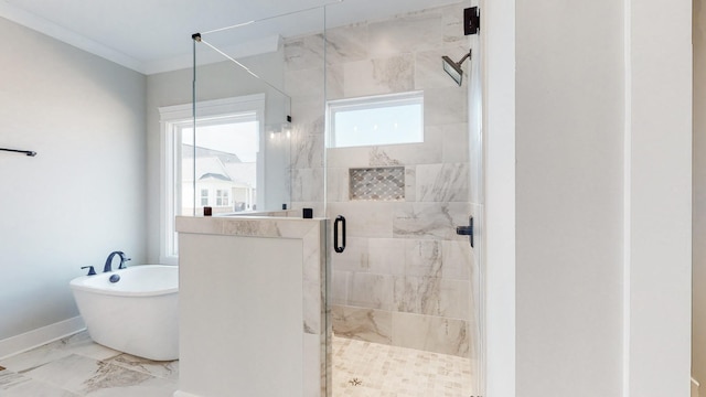 bathroom featuring ornamental molding and shower with separate bathtub