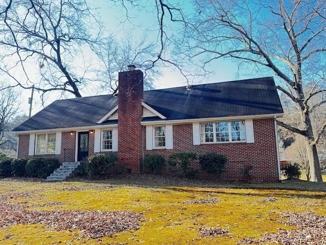 ranch-style home with a front yard