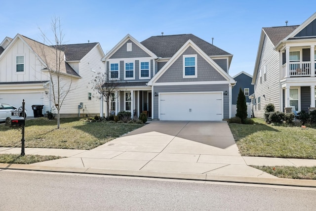 view of front of house with a garage and a front lawn