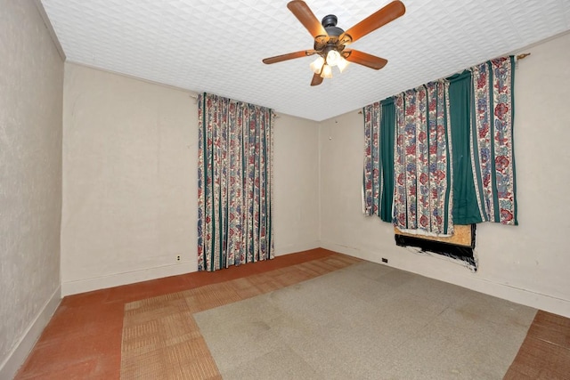 unfurnished room featuring ceiling fan