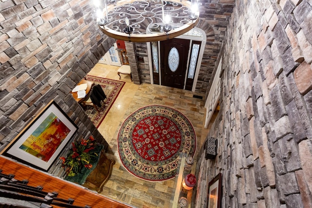 entryway with brick ceiling