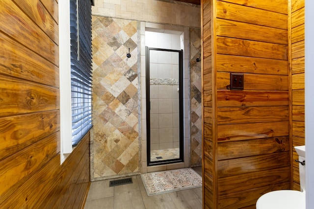 bathroom with an enclosed shower