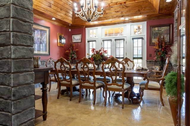 dining room featuring wood ceiling, an inviting chandelier, vaulted ceiling, and french doors