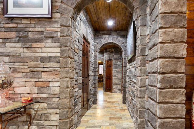 hall featuring wooden ceiling