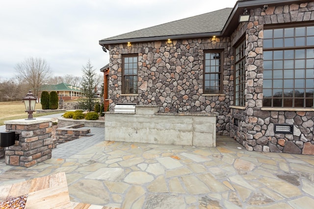 view of patio / terrace with a garage