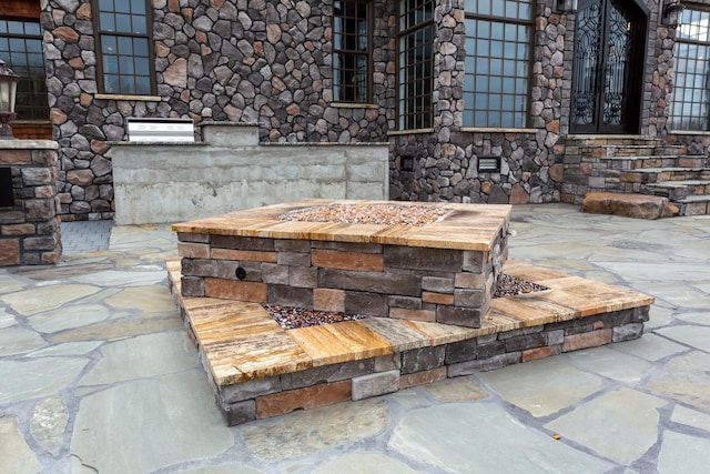 details with an outdoor fire pit