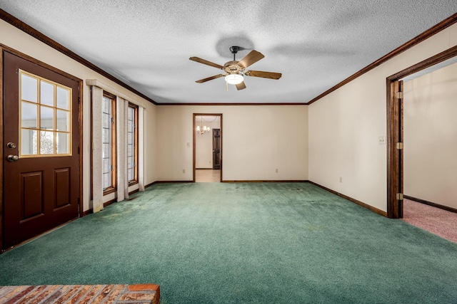 interior space featuring ceiling fan with notable chandelier, crown molding, carpet floors, and a textured ceiling