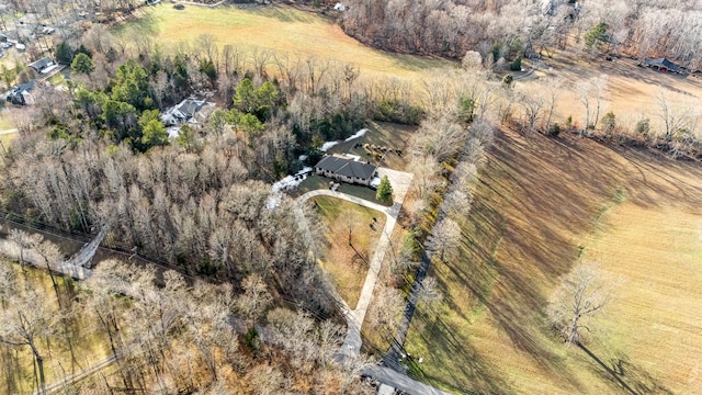 birds eye view of property featuring a rural view