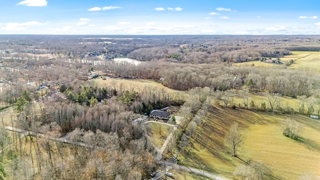 birds eye view of property with a rural view