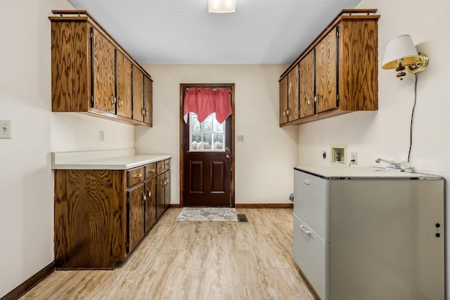 kitchen with light hardwood / wood-style flooring