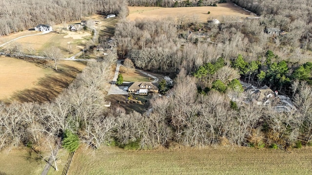 birds eye view of property with a rural view