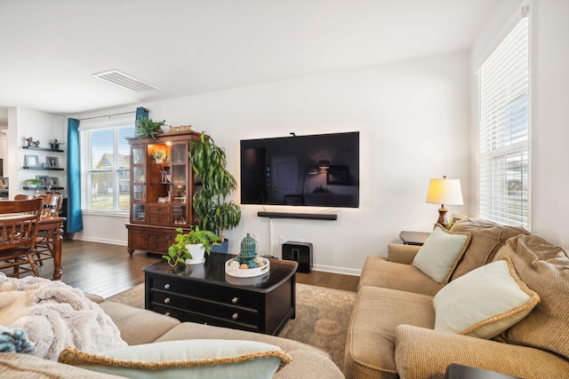 living room with dark hardwood / wood-style floors