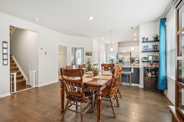 dining area featuring dark hardwood / wood-style flooring