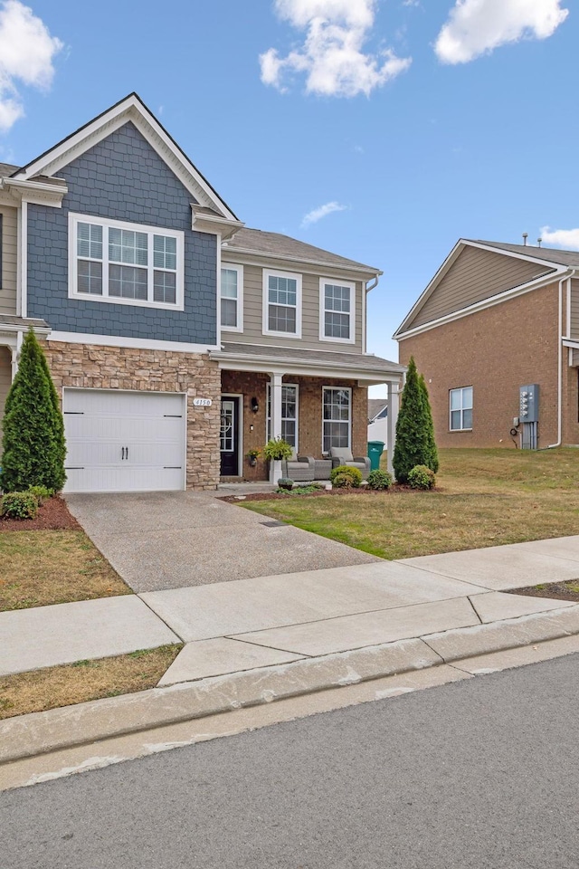 view of front facade with a garage and a front yard