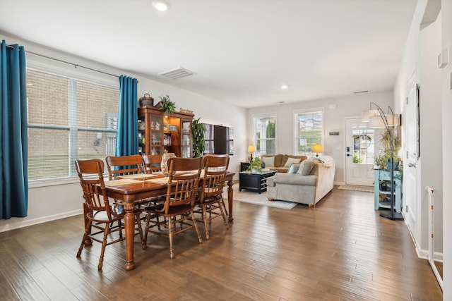 dining room featuring dark hardwood / wood-style flooring