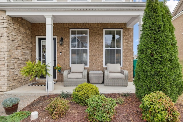 entrance to property featuring a porch