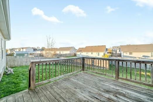 wooden deck with a yard