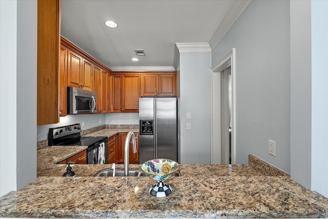 kitchen featuring stone counters, appliances with stainless steel finishes, sink, kitchen peninsula, and crown molding