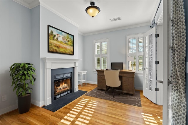 office space featuring hardwood / wood-style flooring and ornamental molding