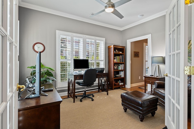 office space featuring crown molding, french doors, and ceiling fan