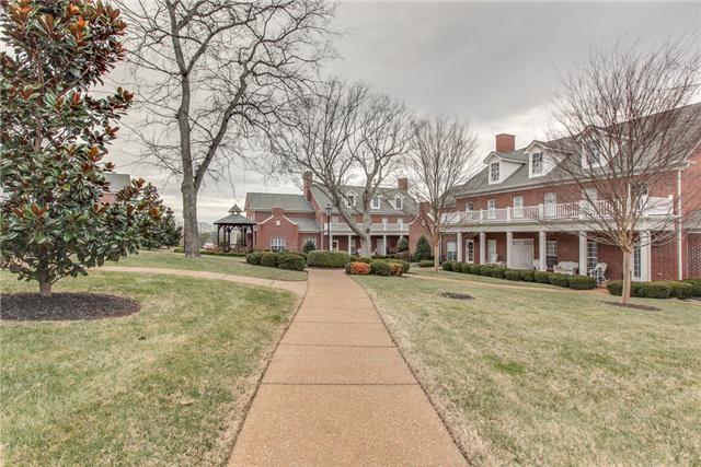 view of front of property with a gazebo and a front yard