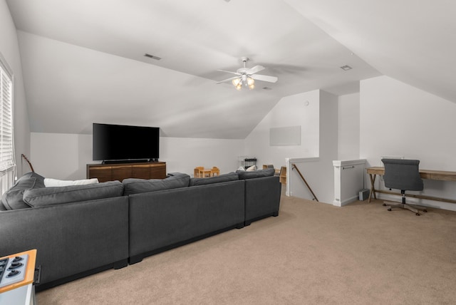 living room with ceiling fan, light colored carpet, and lofted ceiling