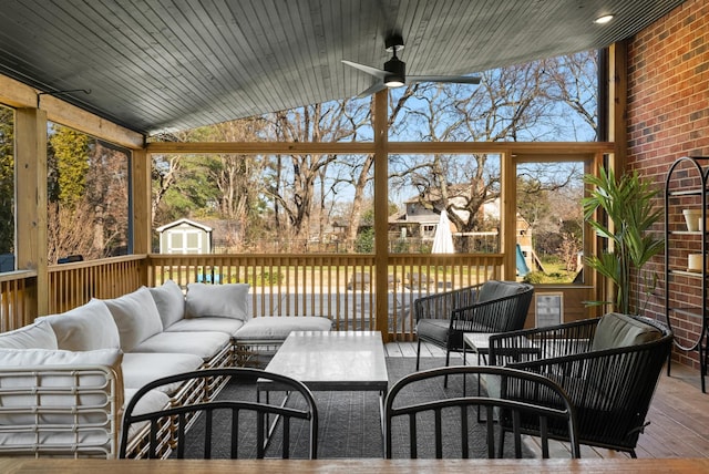 exterior space featuring ceiling fan, lofted ceiling, and wood ceiling