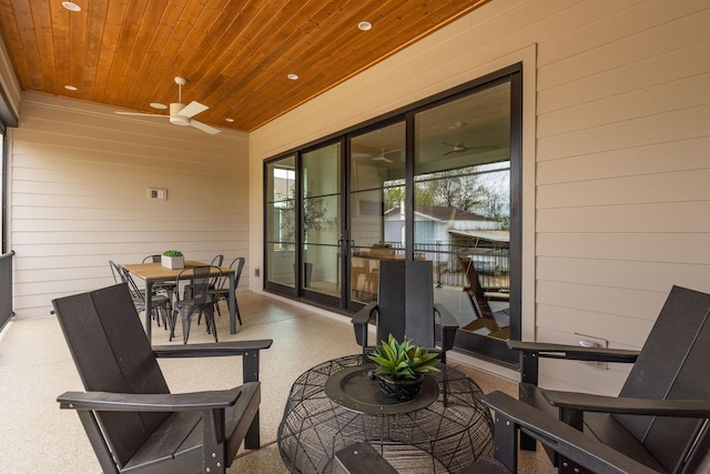 view of patio / terrace featuring outdoor dining space and a ceiling fan