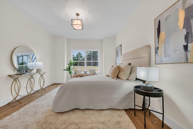 bedroom featuring hardwood / wood-style floors