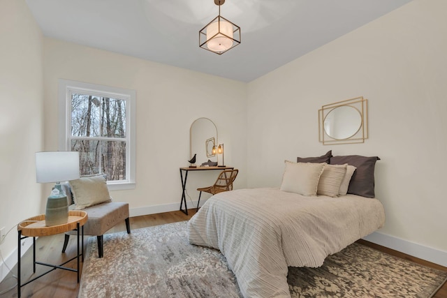 bedroom featuring wood-type flooring