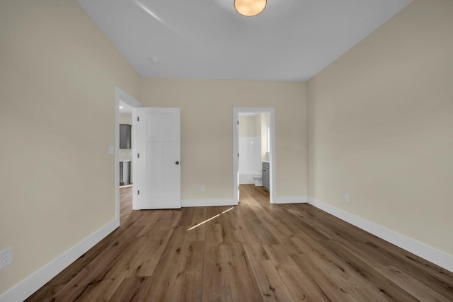 unfurnished bedroom with light hardwood / wood-style flooring