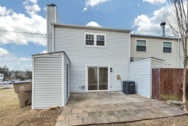 back of property with a patio area