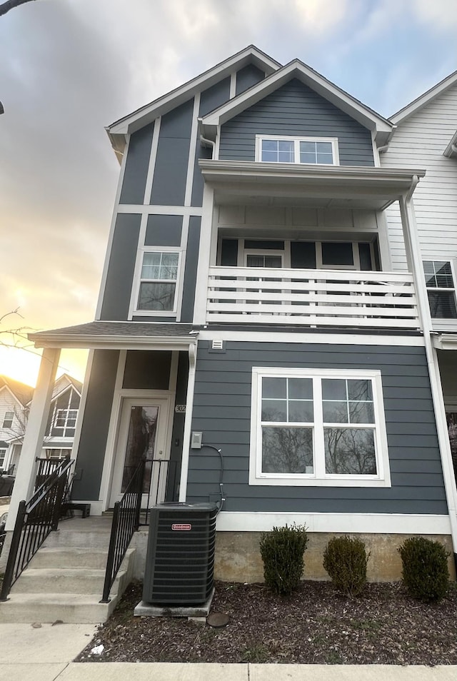 view of front of home with cooling unit