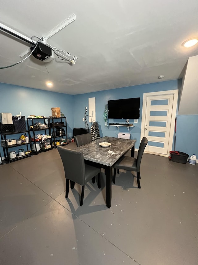 dining area featuring concrete floors