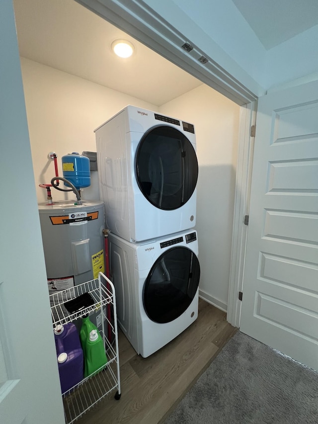 302 Williams Ave Unit 110, Madison, TN 37115 - washroom with stacked washer and dryer, wood finished floors, visible vents, and laundry area