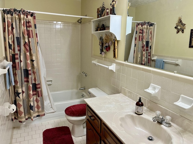 full bathroom featuring tile patterned flooring, vanity, shower / bath combination with curtain, tile walls, and toilet