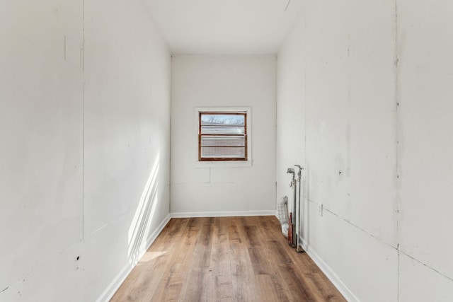 empty room featuring hardwood / wood-style flooring