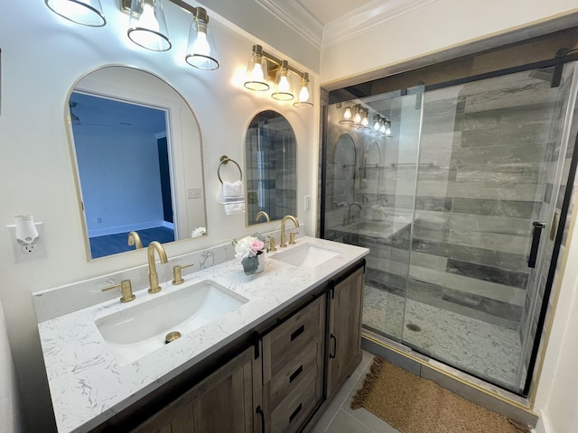 bathroom featuring tile patterned flooring, vanity, walk in shower, and ornamental molding