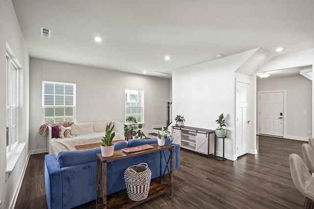 living room with dark hardwood / wood-style flooring