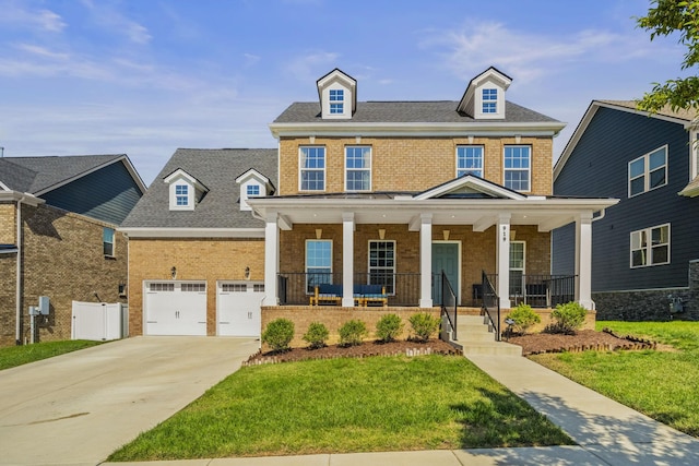 view of front of house with a porch and a front yard