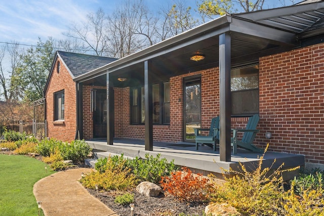 view of home's exterior featuring covered porch