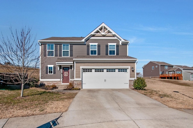 view of front of house with a garage and a front yard