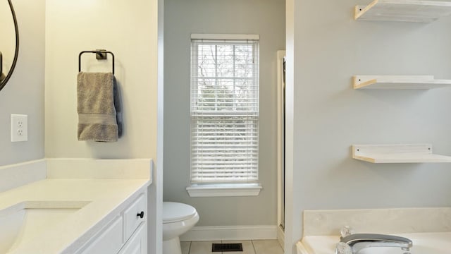 full bathroom featuring vanity, toilet, separate shower and tub, and tile patterned flooring