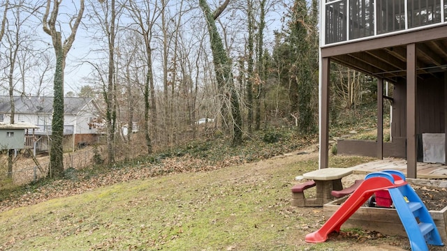 view of yard with a sunroom