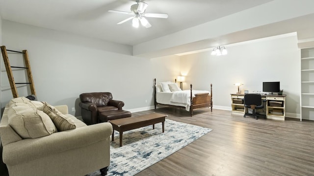 bedroom with ceiling fan and hardwood / wood-style flooring