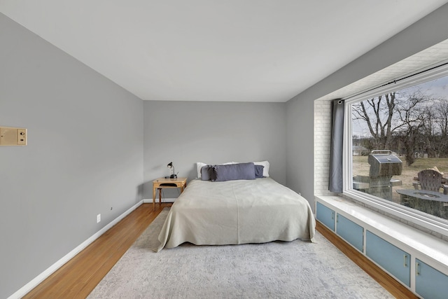 bedroom featuring hardwood / wood-style floors