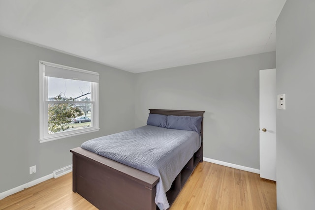 bedroom featuring light wood-type flooring