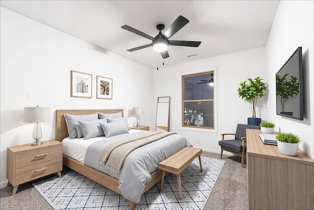 carpeted bedroom with visible vents and baseboards