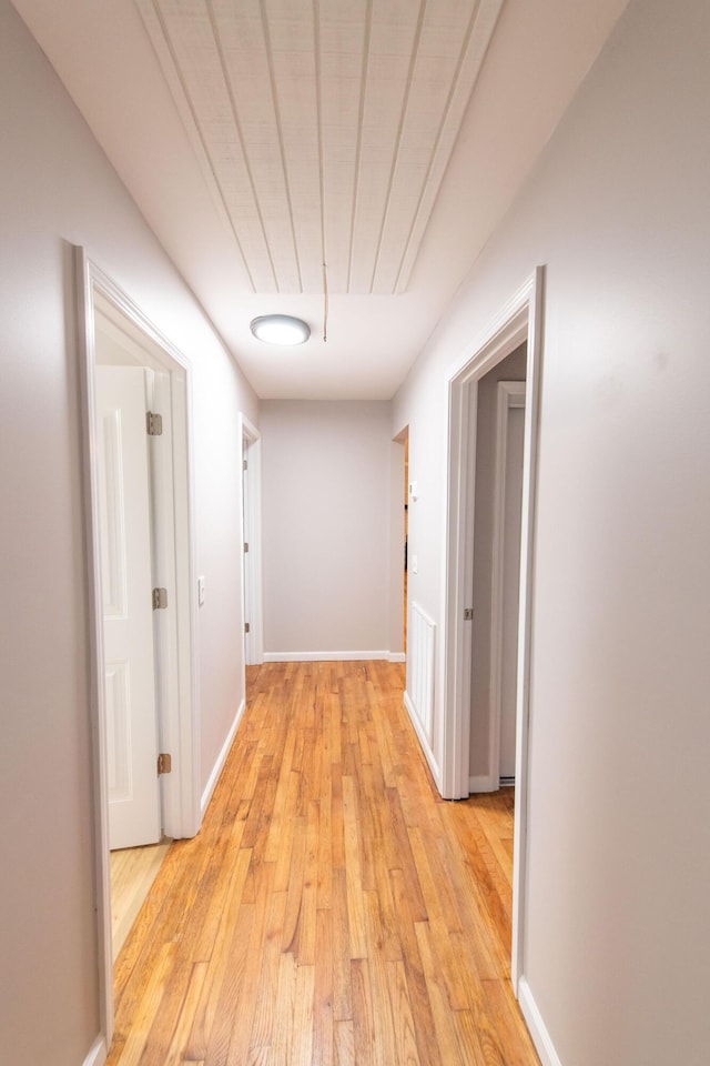 corridor featuring light wood-type flooring