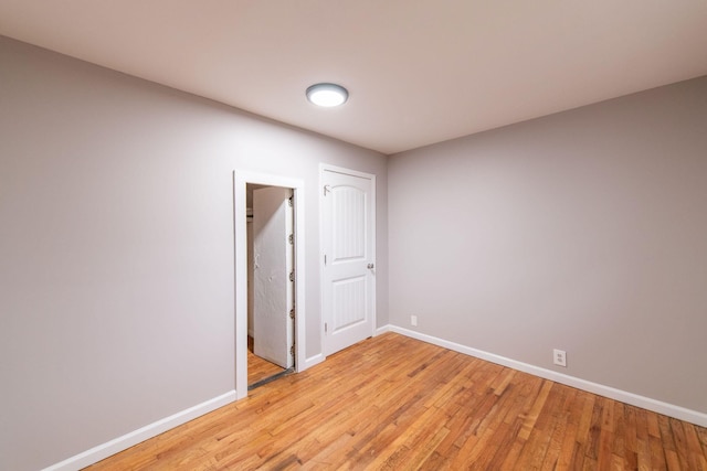 empty room with light wood-type flooring